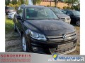 volkswagen-tiguan-14-tsi-bmt-sportstyle-xenon-pdc-climatr-90-kw-122-ch-small-2