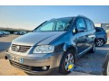 volkswagen-touran-highline-20-tdi-140-small-1