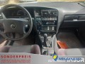 opel-omega-a-caravan-20-106-kw-144-ch-small-4